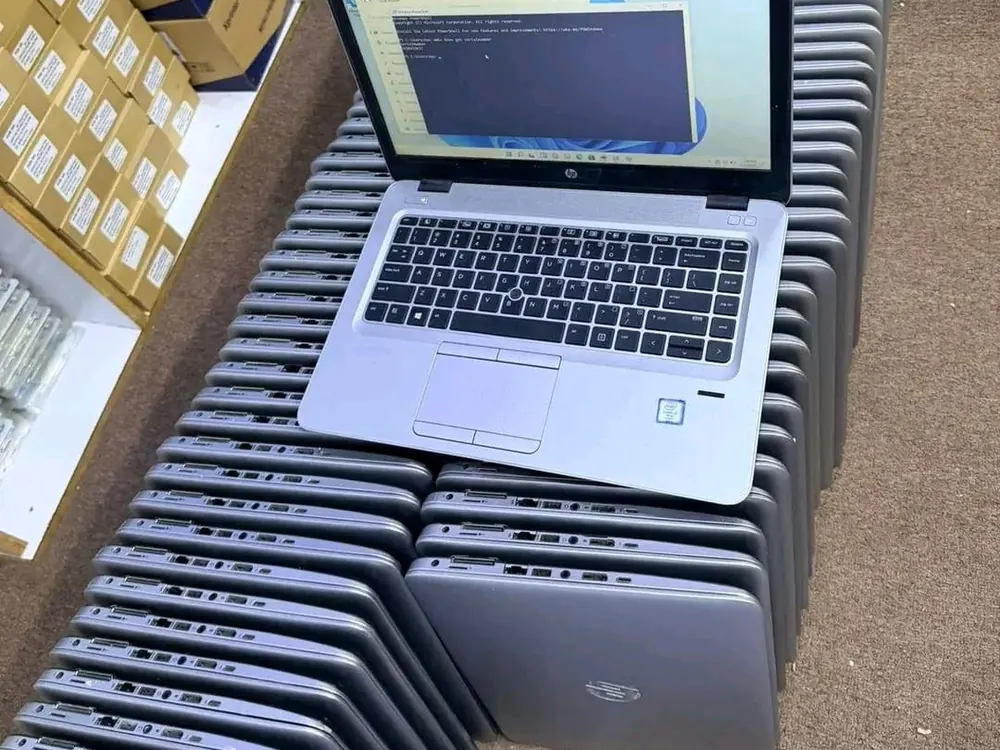 Batch of refurbished HP laptops prepared for an office order